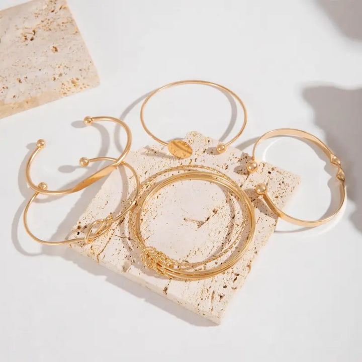 Anspruchsvolles, geknüpftes, elegantes Goldfarbenes Armband-Set