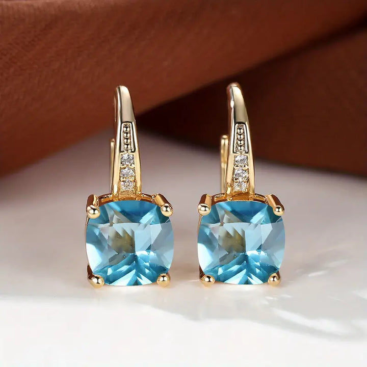 Elegante mystische Steine Goldfarben Creolen