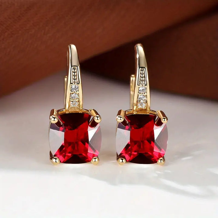 Elegante mystische Steine Goldfarben Creolen