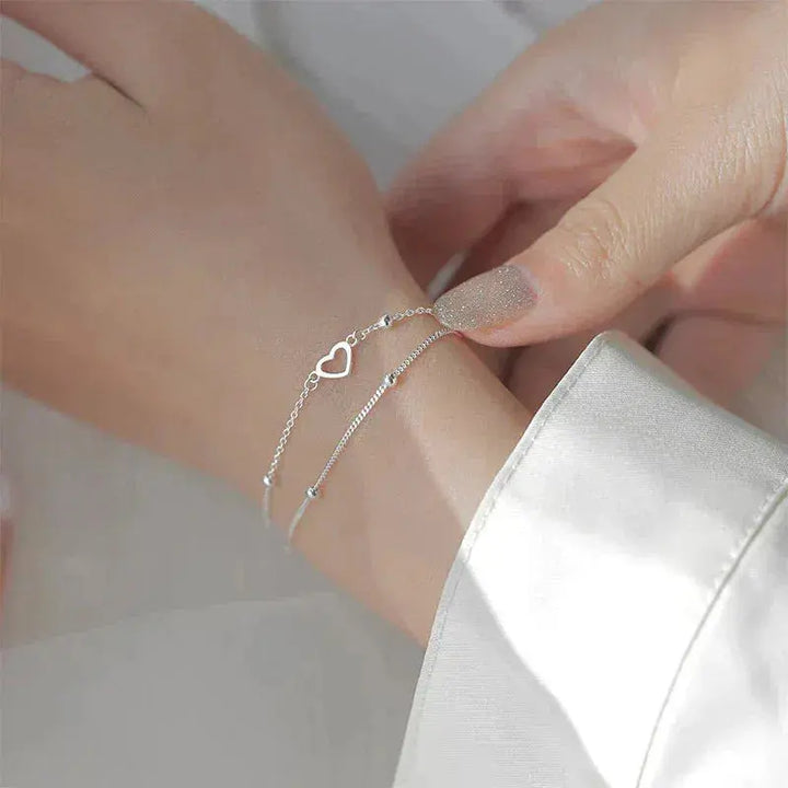 Bracelet en argent avec passeport Herz et Individual Passable