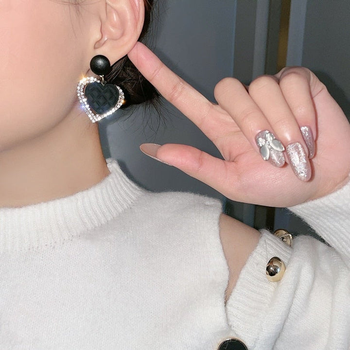 Boucle d'oreille Black Herz en or 