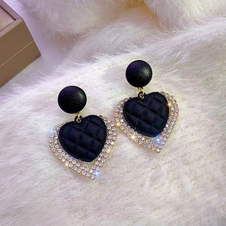 Boucle d'oreille Black Herz en or 