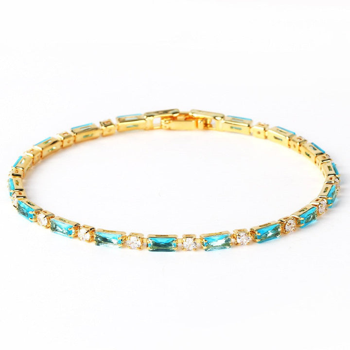 Elegantes Armband aus natürlichem Türkis und Goldfarben