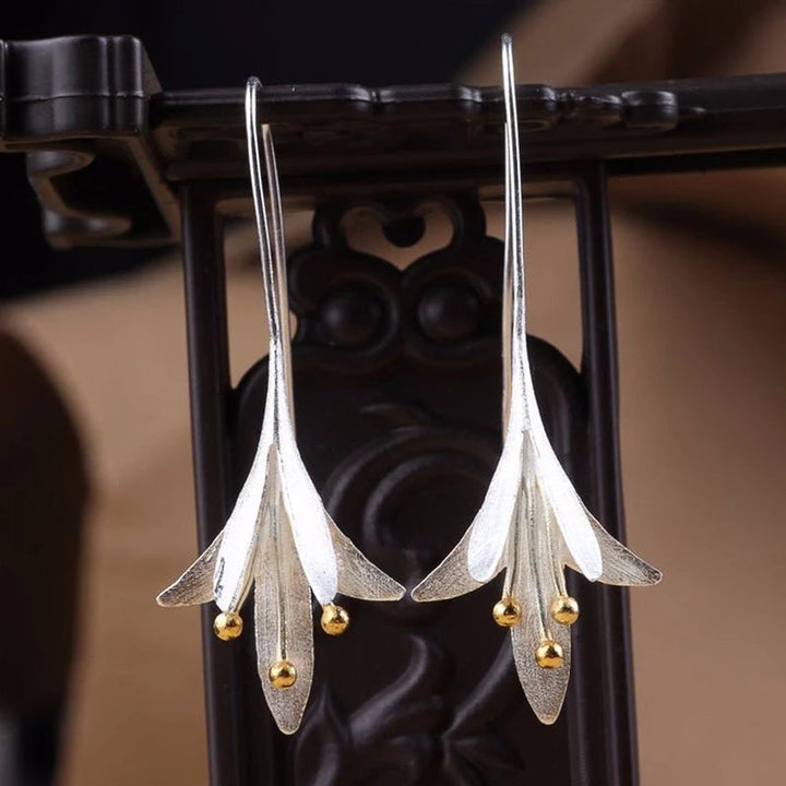 Boucles d'oreilles élégantes en fleurs d'argent 
