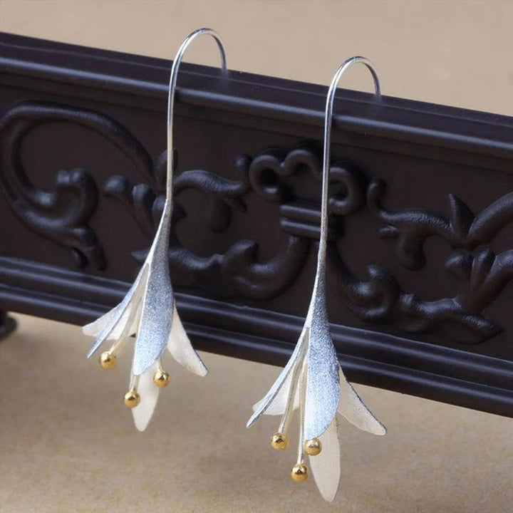 Boucles d'oreilles élégantes en fleurs d'argent 