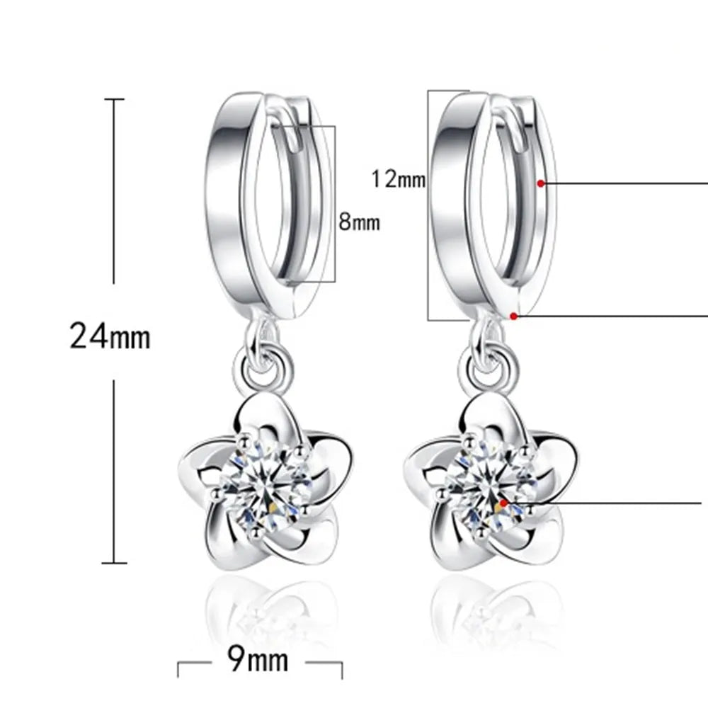 Bague en argent massif ornée de zirconiums lilas et blancs
