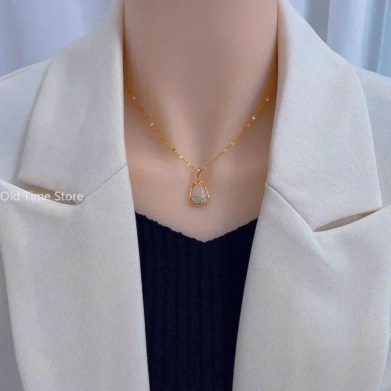 Collier élégant en forme de tulipe dorée avec pendentif en cristal rose
