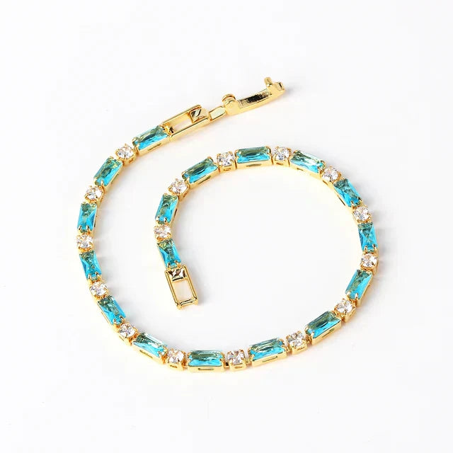 Elegantes Armband aus natürlichem Türkis und Goldfarben