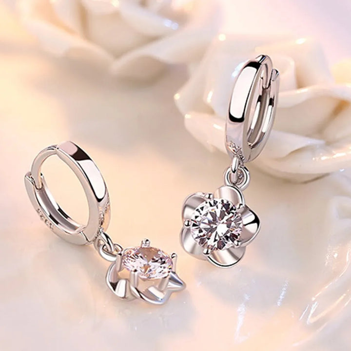 Bague en argent massif ornée de zirconiums lilas et blancs