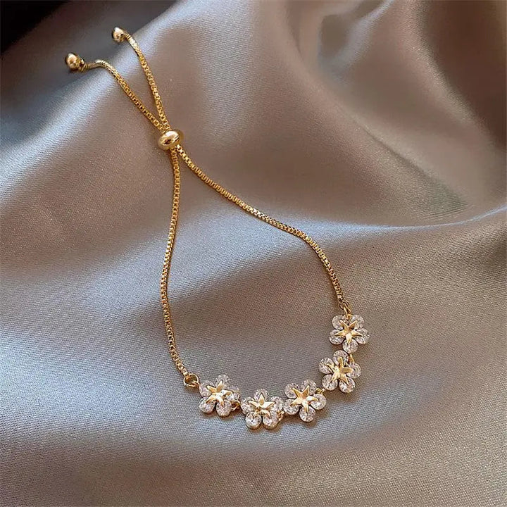 Bracelet Kristall-Gänseblümchen en or