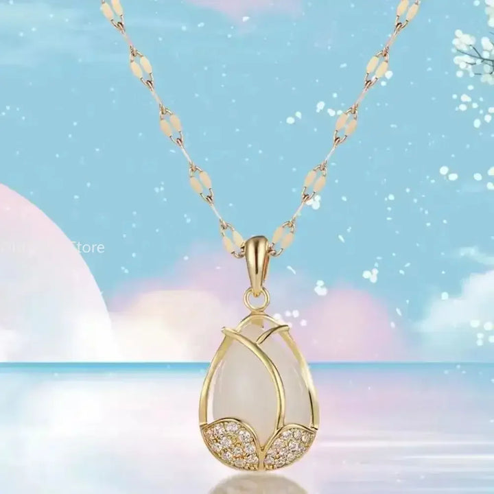 Collier élégant en forme de tulipe dorée avec pendentif en cristal rose