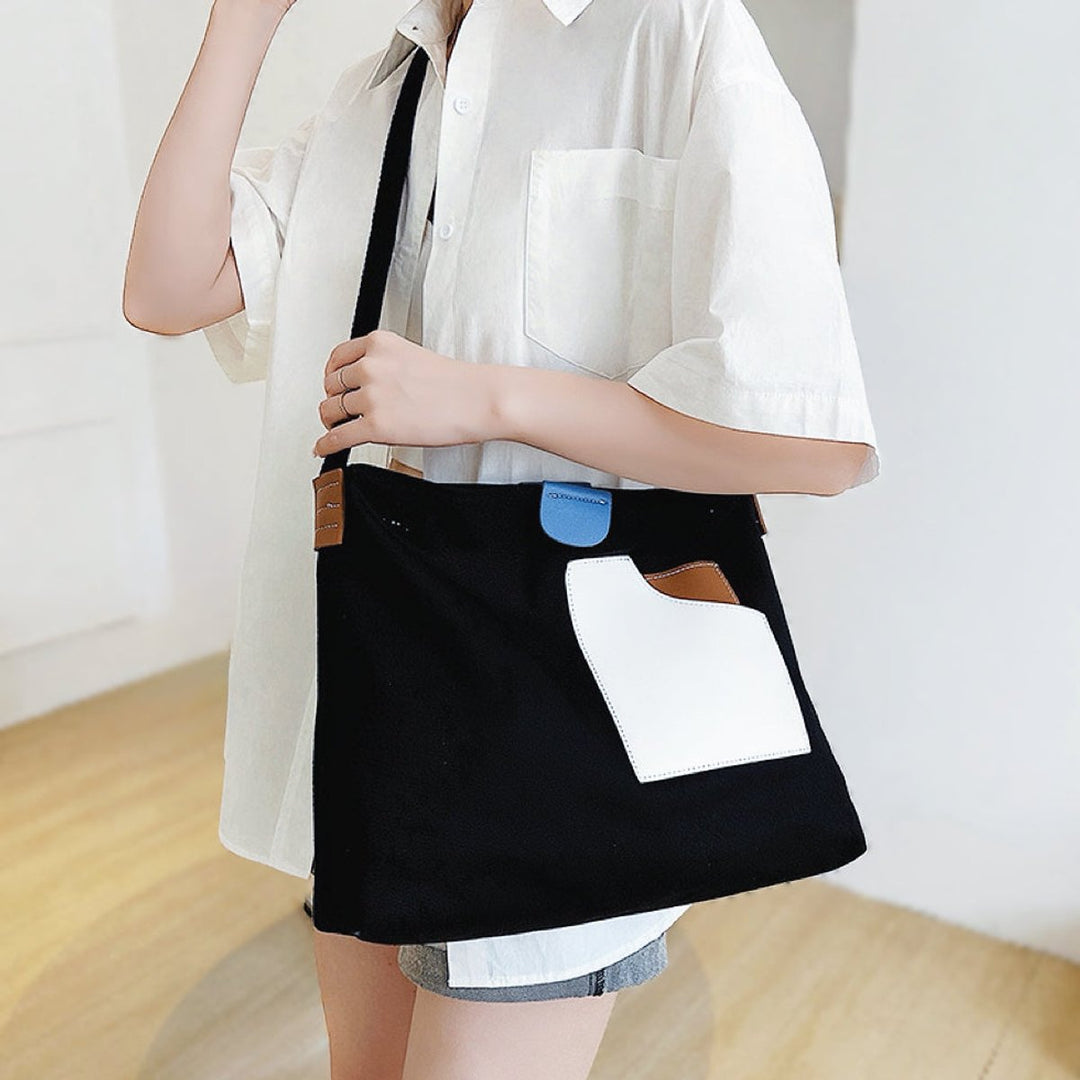 Damen Canvas Schultertasche mit modernen Kontrastakzenten in Schwarz