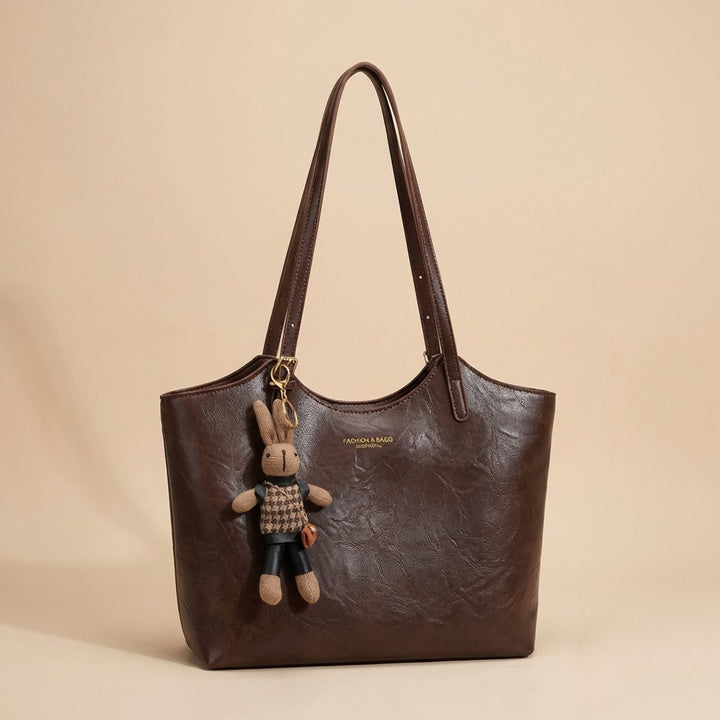 Damen geräumige Schultertasche aus weichem Veganleder in Schwarz