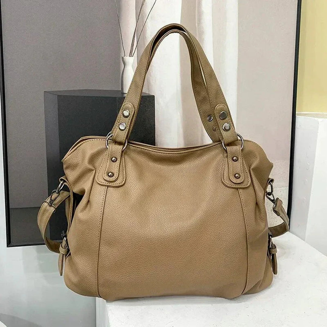 Damen große elegante Kunstleder-Schultertasche mit Nieten in Beige