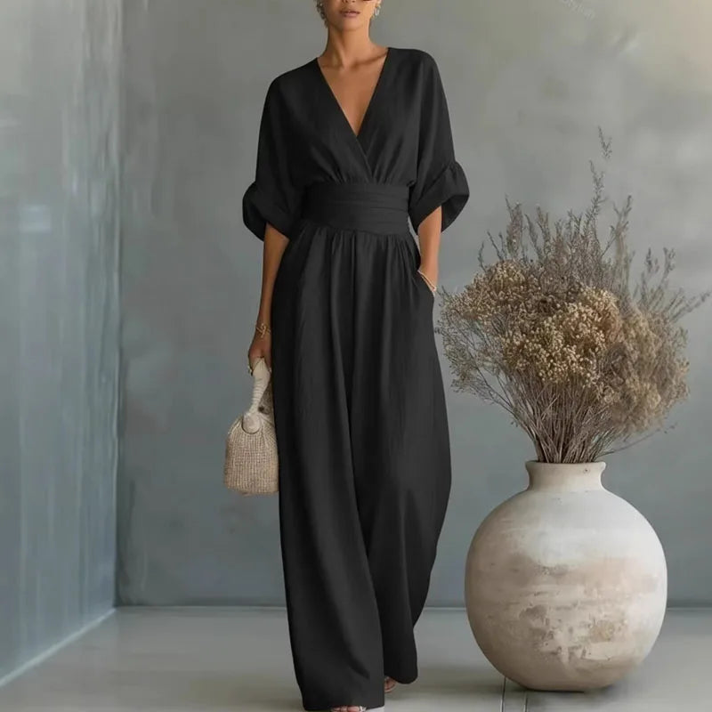 Damen Jumpsuit im Wrap-Stil mit weitem Bein in Schwarz