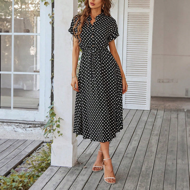 Damen Luftiges Pünktchen-Midikleid in Schwarz