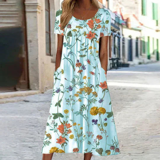 Damen Sommerkleid mit Blumenmuster im Midi-Schnitt in Hellblau