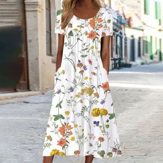 Damen Sommerkleid mit Blumenmuster im Midi-Schnitt in Weiß