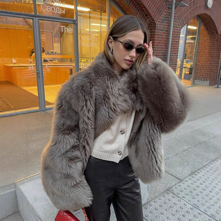 Damen Winterjacke aus Kunstfell mit Ballonärmeln (3)