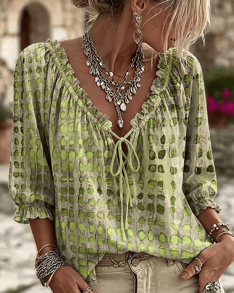 Elegante Damen Bluse mit Puffärmeln und Punkten in Grün