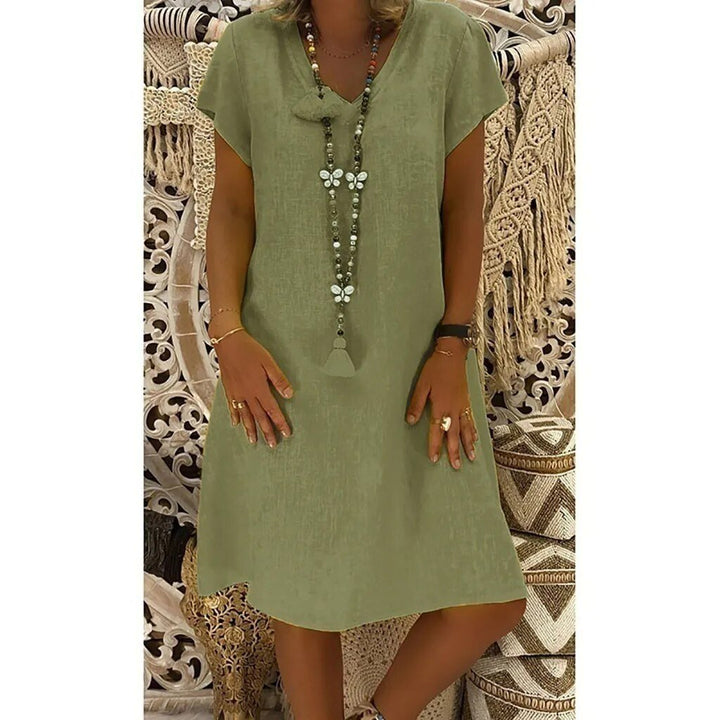 Elegantes Damenminikleid in Leinen zum Sommer in Grün