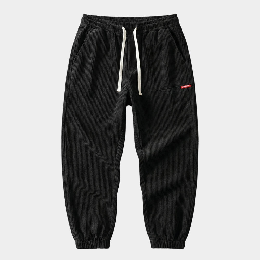 Herren Baggy Joggers mit Rippendetail und Raffung in Schwarz