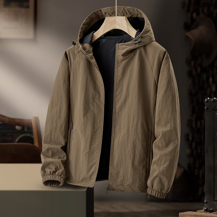 Herren Winterjacke federleicht wasserabweisend minimalistisch in Braun