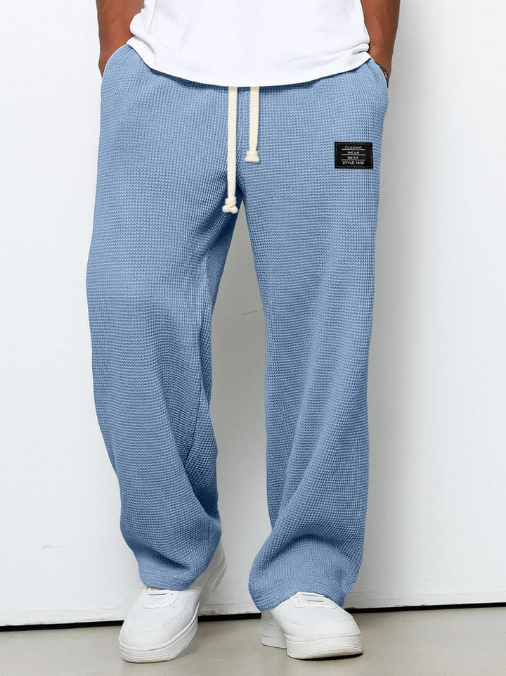 Urbane Herren Jogginghose mit weitem Schnitt in Blau
