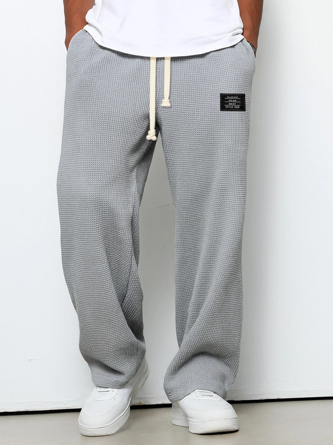 Urbane Herren Jogginghose mit weitem Schnitt in Grau