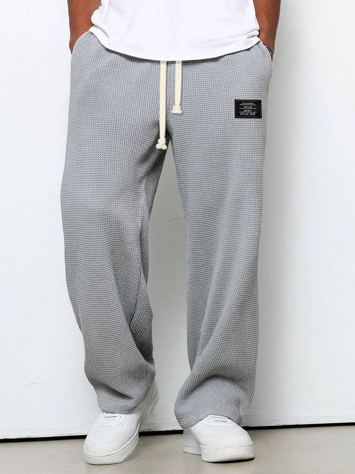Urbane Herren Jogginghose mit weitem Schnitt in Grau
